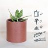 La bougie parfumée dans son pot en matières recyclées PAïSAN